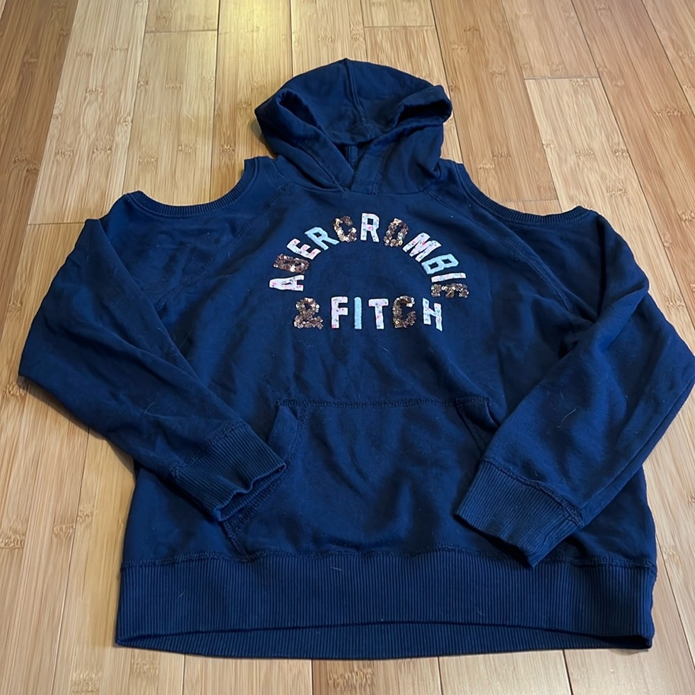 Girls Abercrombie sweatshirt with shoulder holes. Navy blue color.
